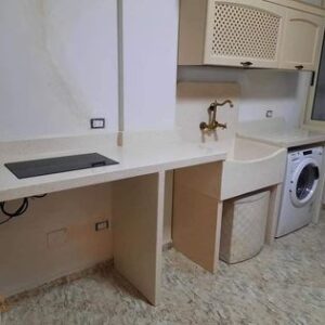 Arredo Giardino Lecce pila e ripiano cottura in graniglia di marmo